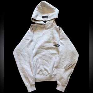 Fear of God Essentials light oat Hoodie